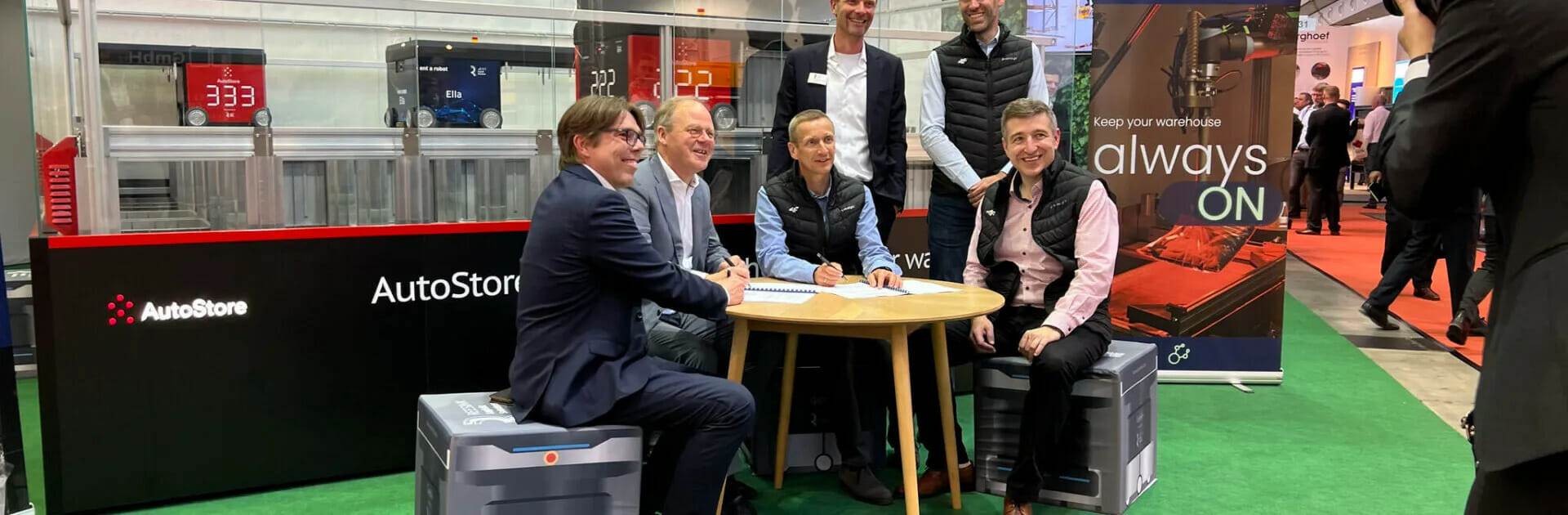 nomagic and reesnick team sat around a table