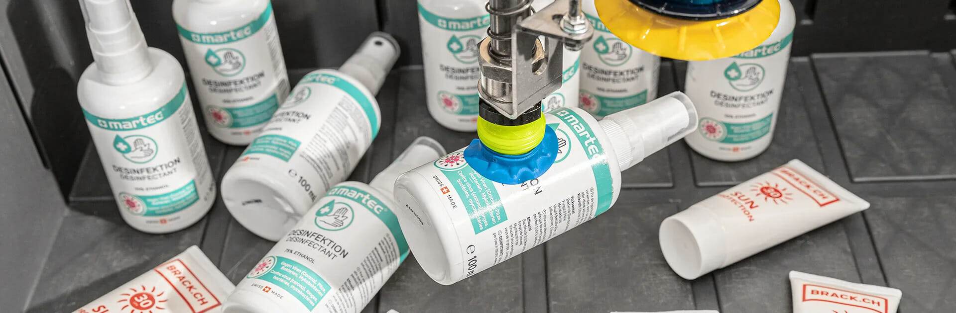 nomagic robot picking up plastic bottles